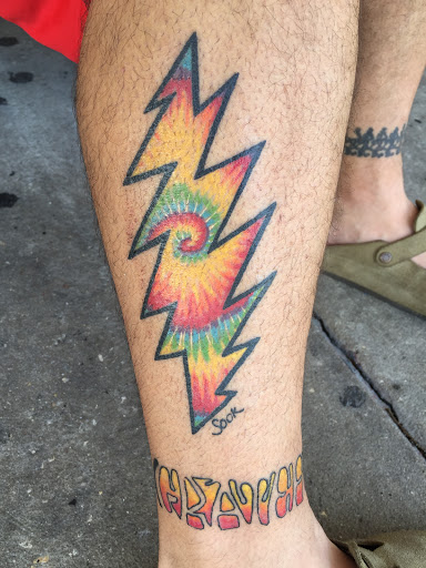 Explore forearm flower tattoo ideas, creative tattoo ideas in Tampa, available at Angel Tattoo