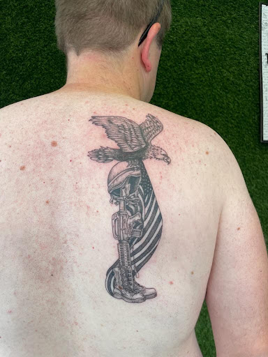 Explore tattoo elbow ideas, creative tattoo ideas in Cocoa, available at Rorschach Tattoo Shop and Piercing Studio