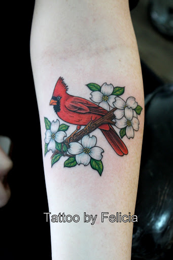 Explore black cat tattoo ideas, creative tattoo ideas in Fort Myers, available at Tiger Lotus Tattoo and Piercing