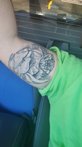 Explore tattoo ideas for bicep, creative tattoo ideas in Dayton, available at 33 Lions Tattoo