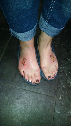 Explore tattoo ideas for hair stylist, creative tattoo ideas in Spartanburg, available at The Gallery Tattoo Shop Spartanburg