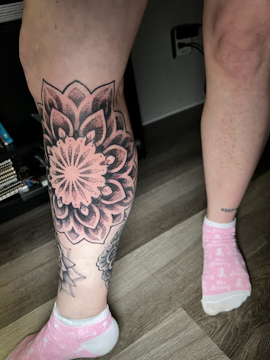 Explore spine tattoo cover up ideas, creative tattoo ideas in Elyria, available at Distilled Ink Tattoo Parlor