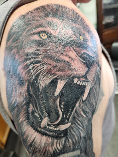 Explore loyalty over love tattoo ideas, creative tattoo ideas in Pittsfield, available at Detail and Color Tattoo