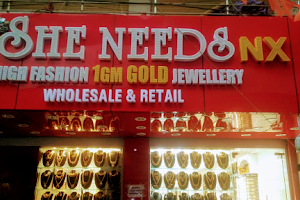 She needs Nx: 1 gram gold jewellery image