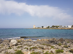 Photo de Spiaggia di Torre Colimena zone sauvage