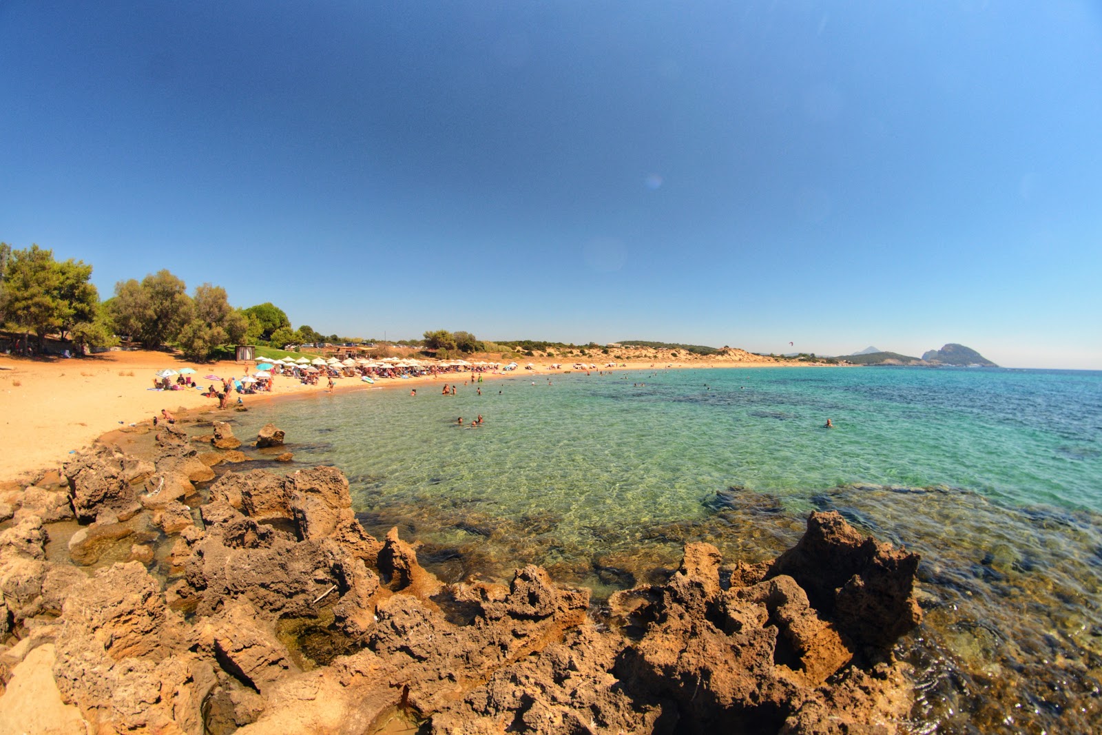 Photo of Romanos beach with turquoise pure water surface
