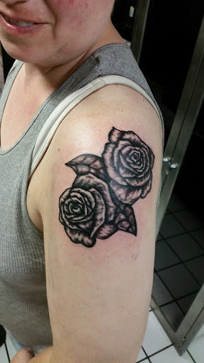 Explore bleeding heart tattoo ideas, creative tattoo ideas in Erie, available at EliKingInk