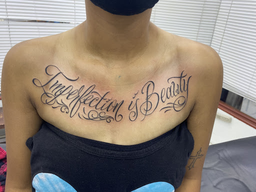 Explore tattoo ideas representing strength, creative tattoo ideas in Sparks, available at Tidal Wave Tattoo