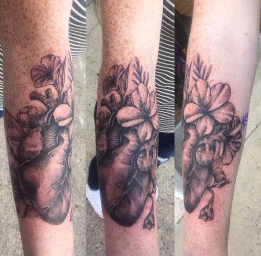 Explore anime neck tattoo ideas, creative tattoo ideas in Lewisburg, available at Rose and Dagger Tattoo