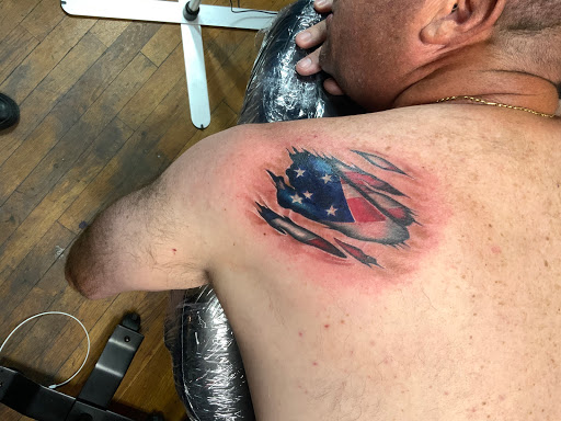 Explore gangster tattoo ideas for men, creative tattoo ideas in Silver City, available at Independent Ink Tattoo