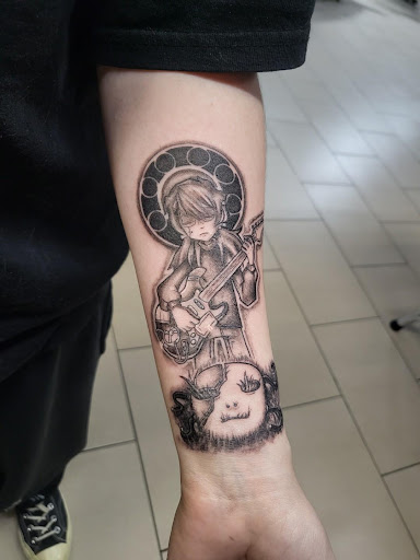 Explore dog tattoo ideas, creative tattoo ideas in Sarasota, available at SEVEN SINS Tattoo Studio