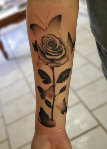 Explore tattoos tramp stamp ideas, creative tattoo ideas in Stamford, available at KE Tattoo Studio