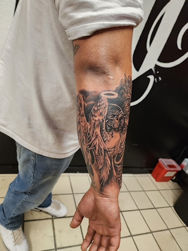 Explore tattoo ideas for death, creative tattoo ideas in Hereford, available at Slow Pain Tattoo Body Art Studio