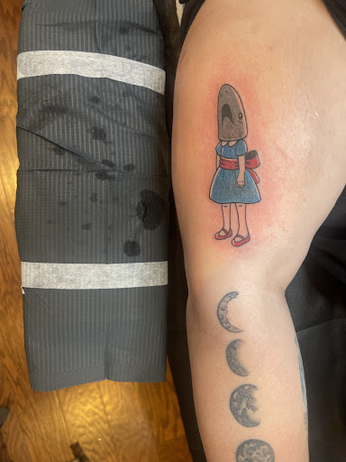 Explore muscle tattoo ideas, creative tattoo ideas in Buffalo, available at True Gloom Tattoo Studio