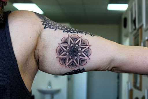 Explore hisoka tattoo ideas, creative tattoo ideas in Fort Myers, available at Tiger Lotus Tattoo and Piercing