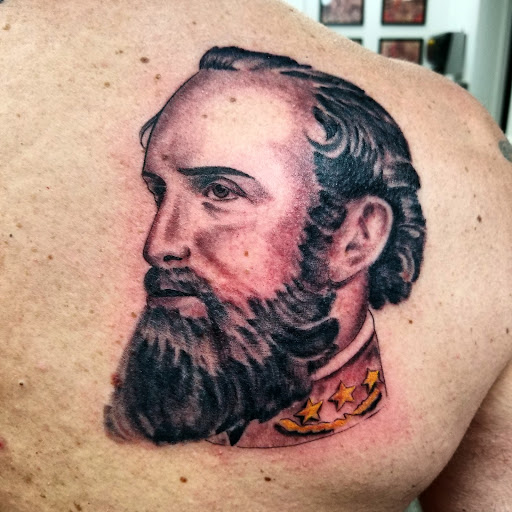 Explore black medusa tattoo ideas, creative tattoo ideas in Redford, available at Empire Tattoo Studio