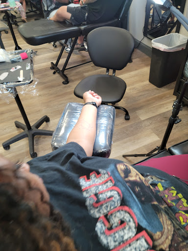 Explore sleeve filler tattoo ideas, creative tattoo ideas in Oviedo, available at Fine Ink Studios Tattoos