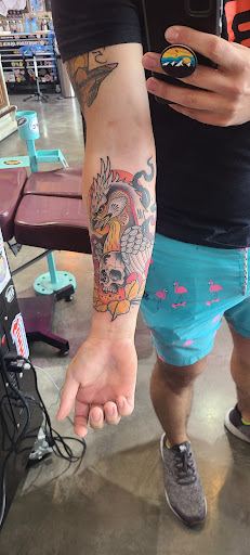 Explore thigh cover up tattoo ideas, creative tattoo ideas in Junction City, available at Patriot Tattoo Company