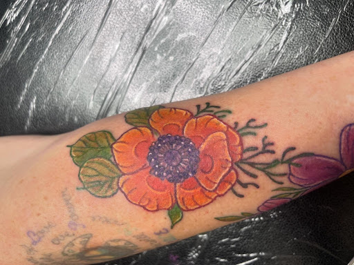 Explore female side tattoo ideas, creative tattoo ideas in Clintonville, available at Honey Heart Tattoo