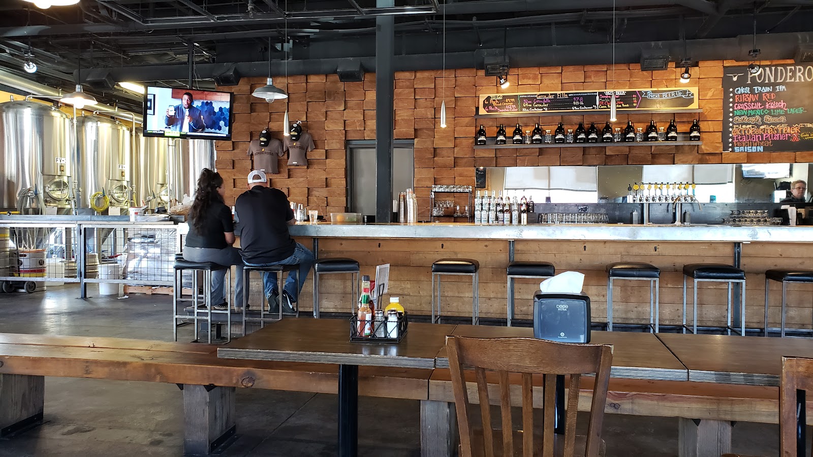 Brewing tanks in a taproom