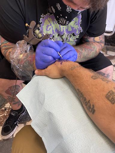 Explore ectopic pregnancy tattoo ideas, creative tattoo ideas in New Orleans, available at Downtown Tattoos and Piercing