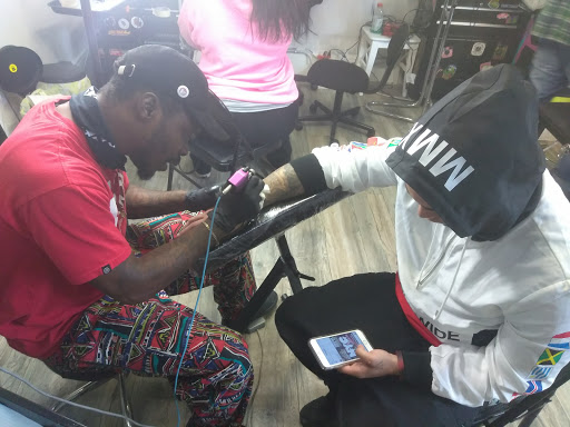 Find tummy tuck tattoo ideas for your next unique tattoo in Atlanta at Iron Palm Tattoos & Body Piercing Atlanta