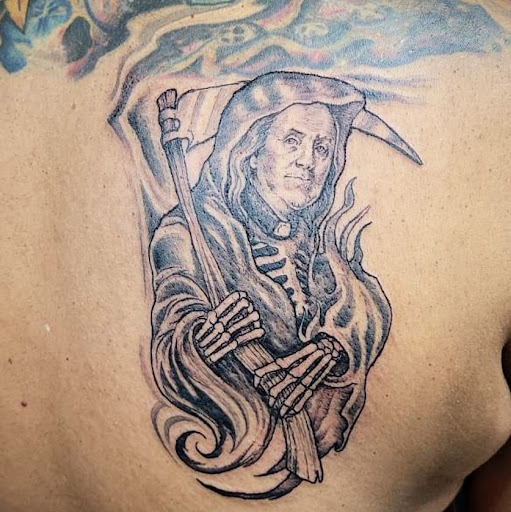 Explore spark plug tattoo ideas, creative tattoo ideas in Westland, available at Premier Tattoo Company Westland