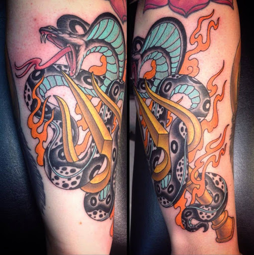 Explore dinosaur tattoo ideas for son, creative tattoo ideas in Westport, available at Darkstar Tattoo and Body Piercing