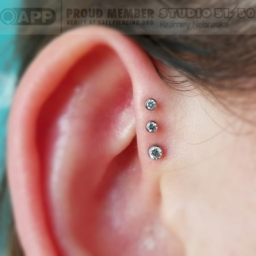 Explore dogwood tree tattoo ideas, creative tattoo ideas in Kearney, available at Studio 5150 Piercing & Fine Jewelry