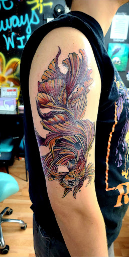 Explore tattoo ideas funny, creative tattoo ideas in Benton, available at Spectrum Tattoo