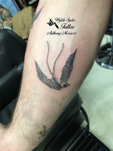 Explore cliff tattoo ideas, creative tattoo ideas in San Diego, available at Wylde Sydes Tattoo & Body Piercing