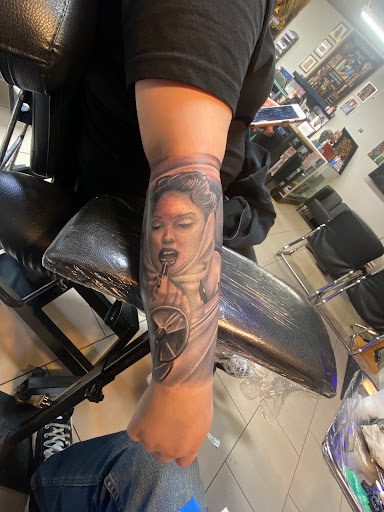 Explore forearm tattoo ideas for men, creative tattoo ideas in Sarasota, available at SEVEN SINS Tattoo Studio