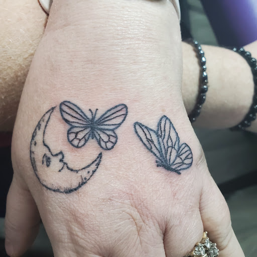 Explore ape tattoo ideas, creative tattoo ideas in Elyria, available at Raven Ink Tattoo & Piercing