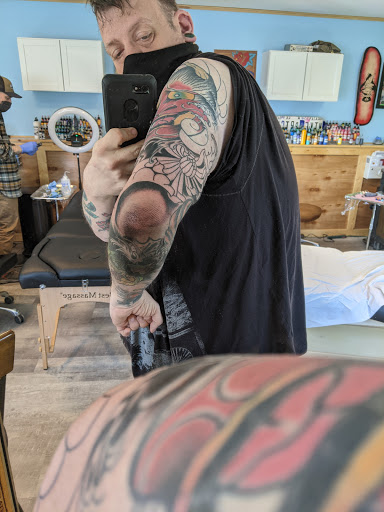 Explore thorn tattoo ideas, creative tattoo ideas in Powell, available at Hummingbird Tattoo Studio