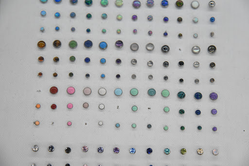 Explore tattoo ideas to represent your child, creative tattoo ideas in Kalamazoo, available at Kitten Flower Boutique Jewelry and Body Piercing