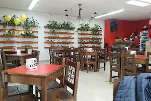 Restaurante y Pizzería Llamarada image