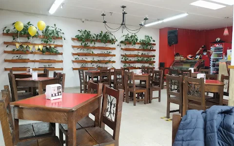 Restaurante y Pizzería Llamarada image