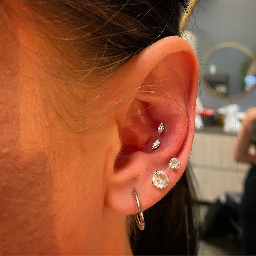 Explore top gun tattoo ideas, creative tattoo ideas in Cary, available at Fine Art Body Piercing By Lilith Mae