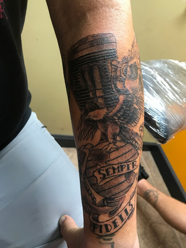 Explore rolling stones tattoo ideas, creative tattoo ideas in Okeechobee, available at Muck City Tattoos & Piercings