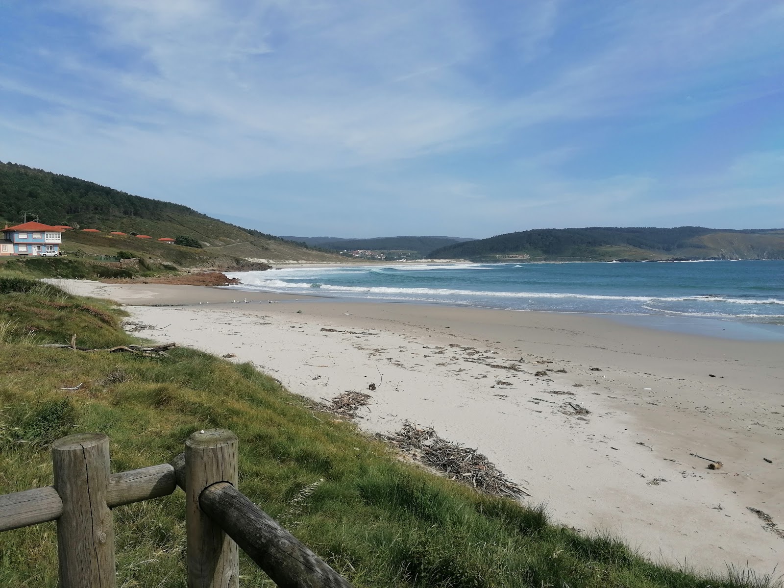 Foto di Praia de Merexo con una superficie del sabbia bianca