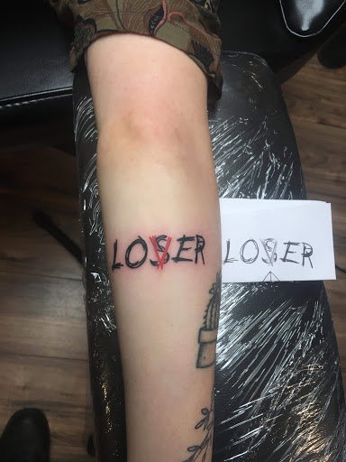 Explore grumpy bear tattoo ideas, creative tattoo ideas in Hudson Falls, available at ALTERED ADDICTION TATTOOS