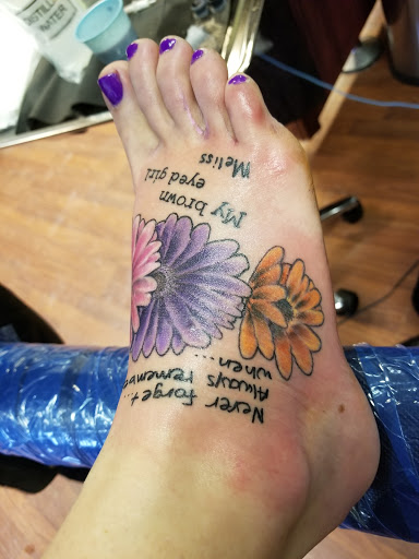 Explore grogu tattoo ideas, creative tattoo ideas in Waterford, available at Dixie Tattoo Company