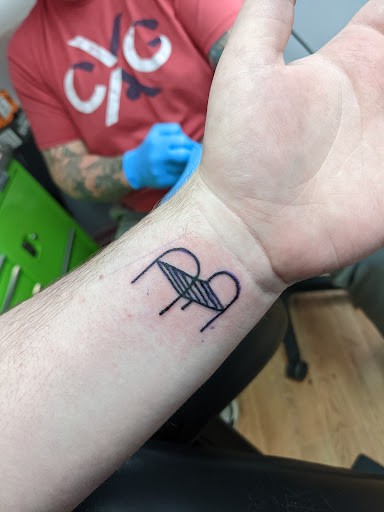 Explore karma tattoo ideas, creative tattoo ideas in Cedar Falls, available at Red Owl Tattoo