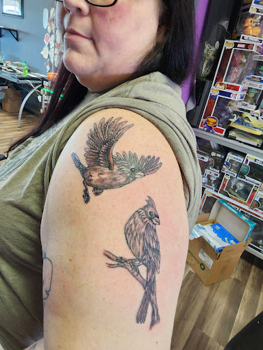 Explore mother and child tattoo ideas, creative tattoo ideas in Williamston, available at Lucky Tiger Tattoo studio