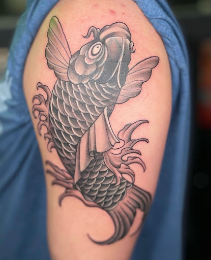 Explore rockstar tattoo ideas, creative tattoo ideas in Peoria, available at Modern Ink Tattoo