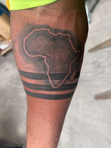 Explore cover up lower back tattoo ideas, creative tattoo ideas in Grovetown, available at Art Collective Tattoos & Piercings