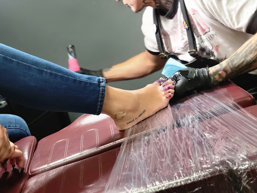 Explore lone wolf tattoo ideas, creative tattoo ideas in Temecula, available at Outlaw Tattoo Studio & Body Piercing