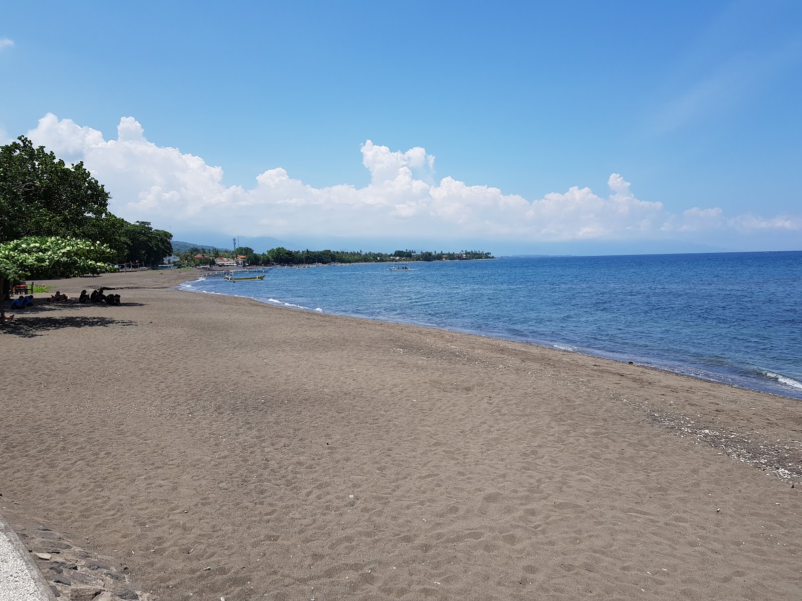 Photo of Lovina Beach with blue pure water surface