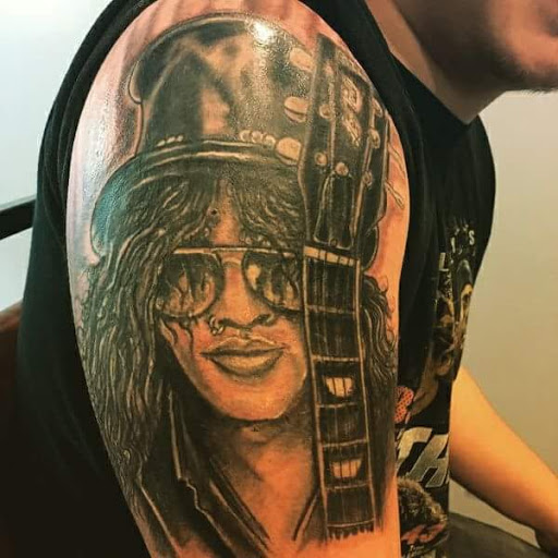 Explore color tattoo sleeve ideas, creative tattoo ideas in Bridgeport, available at Pike Street Studios Tattoo and Body Piercing