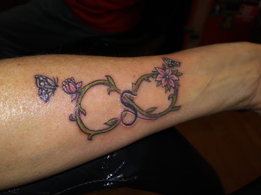 Explore three cross tattoo ideas, creative tattoo ideas in Chattanooga, available at Inked Expressions